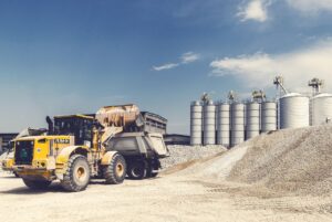 Stockbild inom företag: loader, gravel, digger